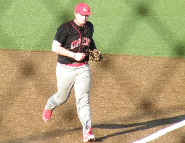Myles Debol records the final out in game one, unassisted, at first base. The freshman knocked in the game winning run in the second game to help the Express sweep Adrian College's JV team. Pictured below is Daniel Heatherly, who recorded the save in game one. Photos by Nicholas Huenefeld/Owens Sports Information