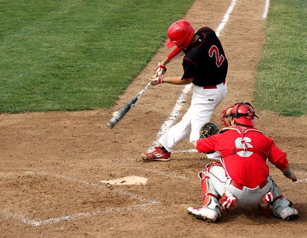 Ryan Horvath connects on a pitch during today's doubleheader against Sinclair CC. Photo by Cherie Guthrie/Owens Sports Information