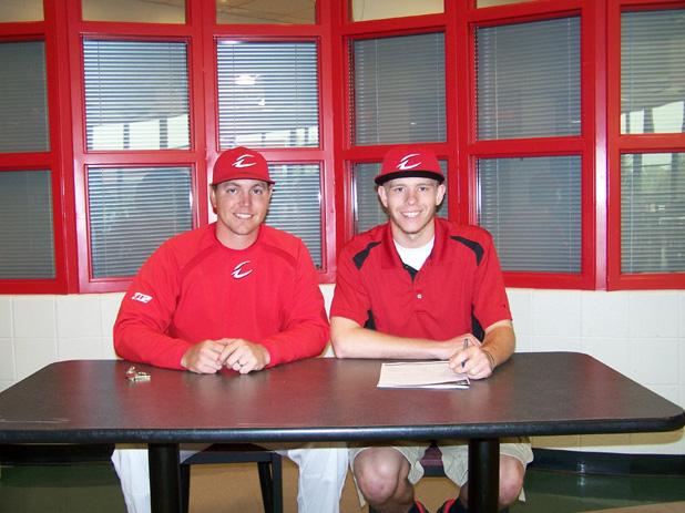 Nick Morrow, right, is pictured here with Express head baseball coach Del Young in a ceremony to commemorate his committment to the Express baseball program recently. Photo courtesy of Owens Sports Information