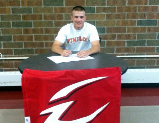 Joe Sickler signs his letter of intent to play baseball for the University of Findlay. Photo by Nicholas Huenefeld/Owens Sports Information