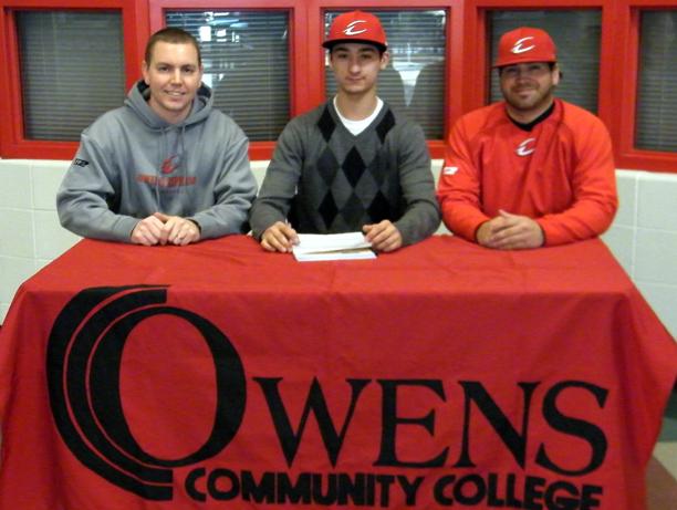 Brandon Zelichowski signed with the Express baseball program on Sunday in the SHAC. He is flanked to his right by Express head coach Del Young and to his right by Express assistant coach Scott Tesluck. Photo courtesy of Owens Sports Information