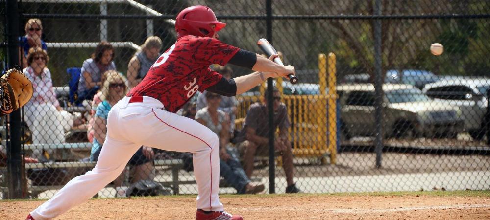 Stephen Parker attempts a bunt. Photo by Frank Rao Jr./Owens Sports Information