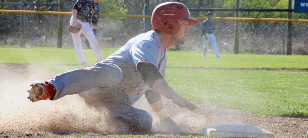 Casey Gose takes a look toward home plate after an uncontested swipe of third base in today's first game. Photo by Nicholas Huenefeld/Owens Sports Information