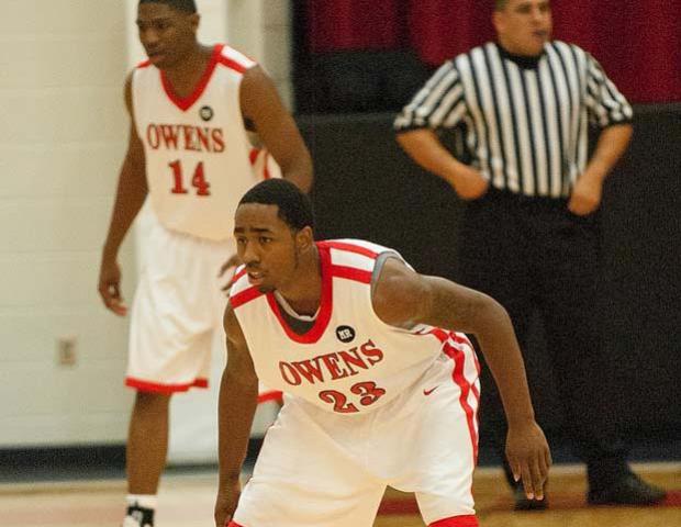 Jeff Burroughs prepares to defend against the OSU Club team. The freshman point guard poured in 24 points in 24 minutes of action to lead the Express to their 14th win this year. Photo by Seth Foley