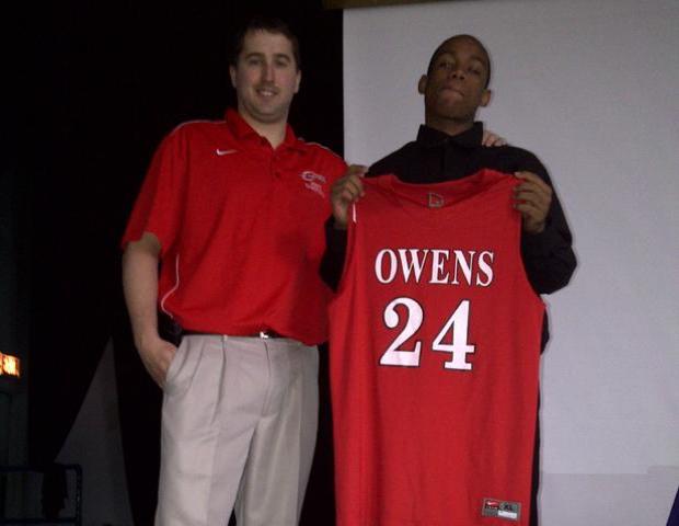 Markese Allen, right, poses with Express men's basketball head coach Dave Clarke after the signing at his high school, Detroit Crockett. Photo courtesy of Owens Sports Information