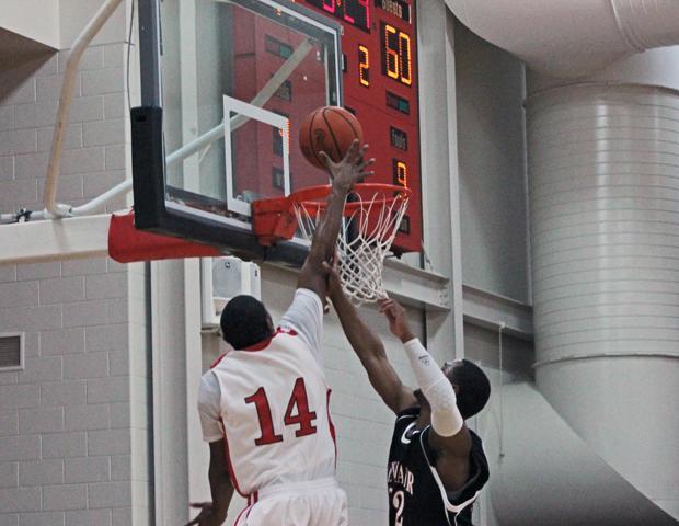 Franklin Lindsey converts a lay-in at the 8:23 mark of the second half on an assist from Markese Allen. The basket gave the Express and 85-60 lead. Photo by David Harrand/Owens Sports Information