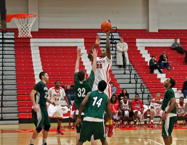 James Kelly rises over Delta's Austin Marine in the second half for two of his game-high 22 points. He added eight rebounds and two steals. Photo by Rudy Yovich/Owens Sports Information