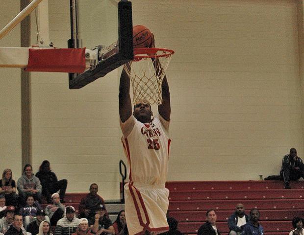 James Kelly, pictured here throwing down a dunk, finished with 22 points, 18 rebounds, three blocks and two steals against No. 16 KVCC, but the Express lost 72-67. Photo by Kyle Wilber/Owens Sports Information