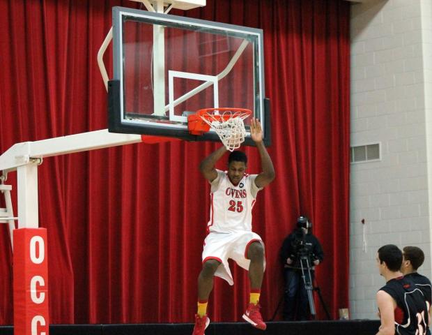 This was a common scene today as James Kelly had seven dunks in a 98-73 win over Sinclair Community College. The sophomore also eclipsed the 1,000 career points mark with a dunk five minutes into the game. Photo by Dave Harrand/Owens Sports Information