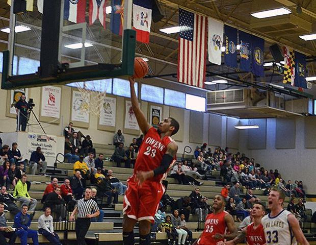 Joe Retic II scores one of his team-high 17 points on this play. He helped lead his team to a come from behind 74-72 win over Iowa Lakes in the NJCAA D-II National Tournament Round of 16 today. Photo by Rudy Yovich/Owens Sports Information