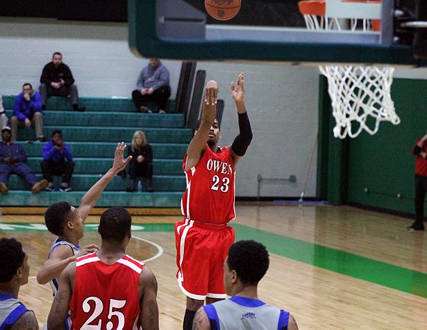 Joe Retic II drills one of his back-to-back 3-pointers during a stretch late in the first half. He led the Express with 20 points and was named all-tourney. Photo by Nicholas Huenefeld/Owens Sports Information