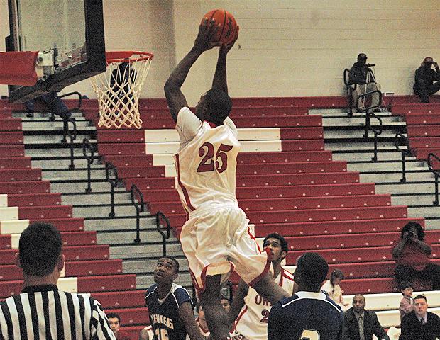 James Kelly throws down a dunk in the second half of an 88-69 Express win over Kellogg CC on Friday. Photo by Kyle Wilber/Owens Sports Information
