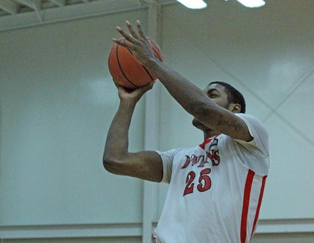 James Kelly, pictured here attacking the basket against Columbus State, was named the OCCAC Player of the Week for the week ending Feb. 3. Photo by Dave Harrand/Owens Sports Information