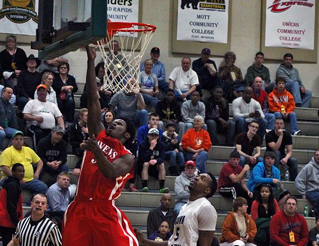 Tony Boykins scores two of his game-high 18 points in today's 80-66 loss to Brown Mackie. Photo by Nicholas Huenefeld/Owens Sports Information