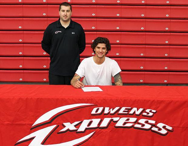 Andy Bachman is pictured here with Express men's basketball head coach Dave Clarke after signing with Tiffin University. Photo by Geoff Roberts/Owens Sports Information