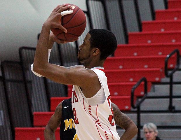 John Murry attempts a free throw in the second half of tonight's 89-79 loss to No. 2 Mott. The freshman had 18 points in the loss. Photo by Nicholas Huenefeld/Owens Sports Information