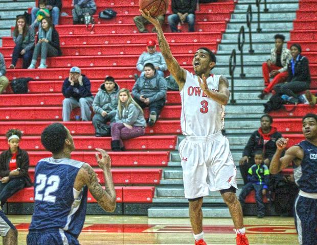 Justin Baker drives for a layup in the first half of today's 103-77 win over Columbus State. He had a season-high 20 points. Photo by Tobias Flemming/Owens Sports Information