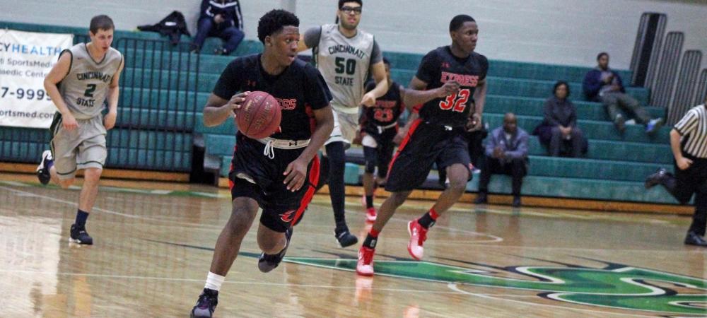 Roy Hatchett pushes the ball on a fast break as Derrik Jamerson trails him. Photo by Nicholas Huenefeld/Owens Sports Information