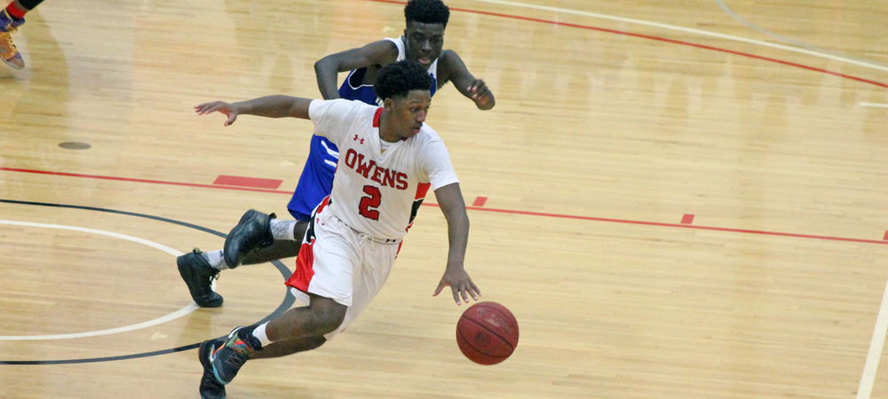 Roy Hatchett Jr. looks to push the ball during last night's game. Photo by Nicholas Huenefeld/Owens Sports Information