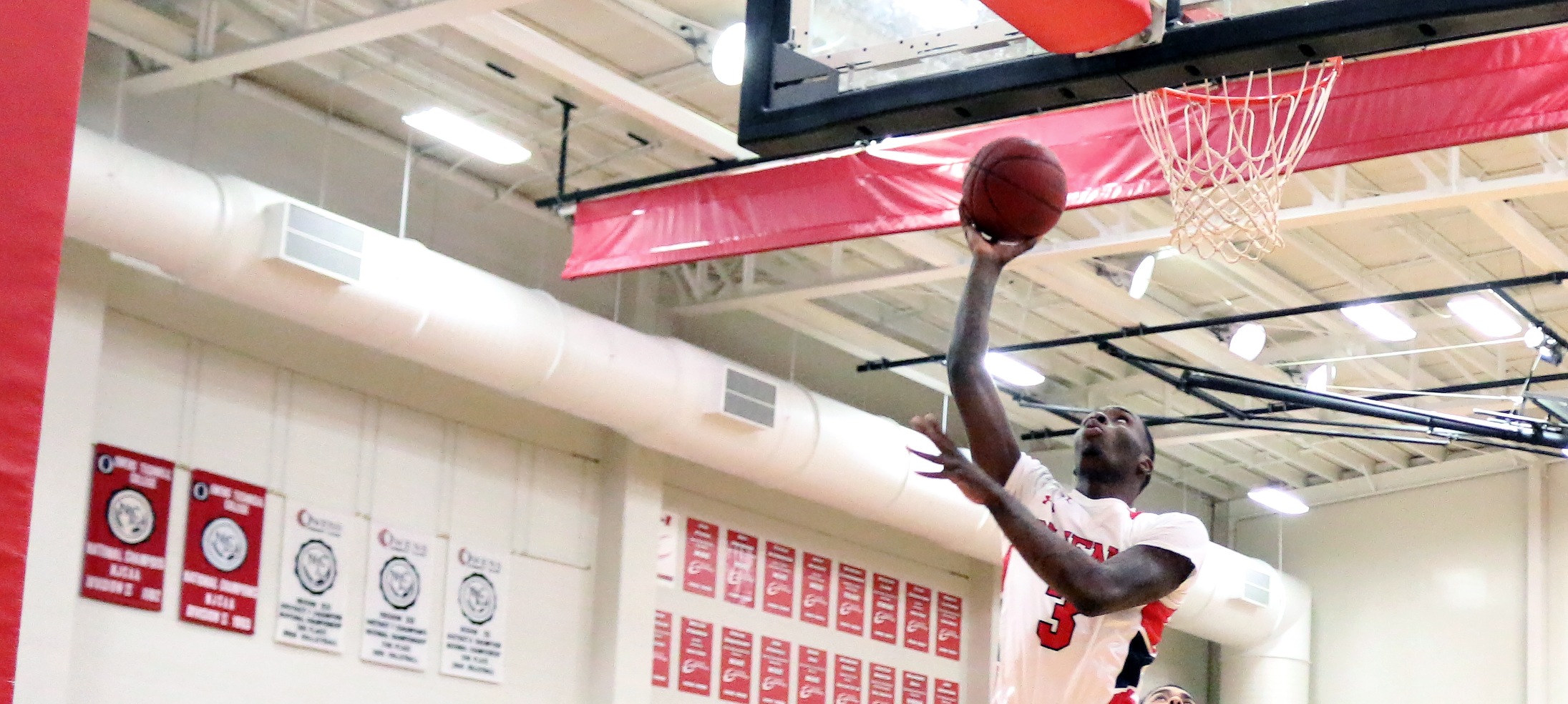 Shondell Jackson attempts a layup against Jackson College in December of this past season. Photo by Owens Sports Information