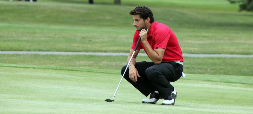 DiGiacomo looks to line up a putt. Photo by Nicholas Huenefeld/Owens Sports Information