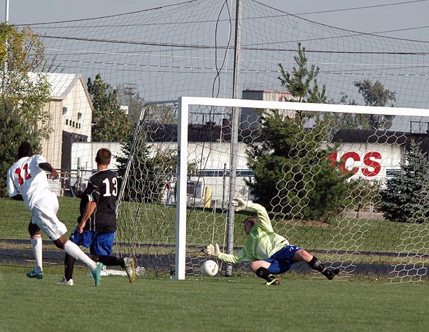 Glenroy Miller is pictured here scoring his second goal of the game, and his 11th of the season, against Cuyahoga Community College on Sept. 12. The sophomore was recently named the OCCAC Player of the Week for the week ending Sept. 16. It was the third consecutive week he has won the award. Photo by Nicholas Huenefeld/Owens Sports Information