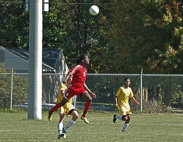 Juavanie Cole heads a ball over the goalie and into the net against Muskegon Community College on Sept. 29. He scored three goals in the 6-1 win, which helped him earn OCCAC and NJCAA Player of the Week honors. Photo by Nicholas Huenefeld/Owens Sports Information
