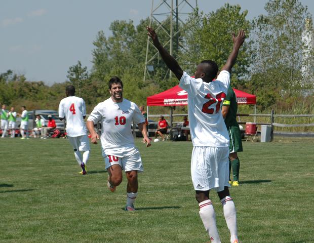 Nickyle Webber (20) celebrates his PK goal that put the Express up 1-0 while Novak Vuk Janicic (10) runs to join the celebration. Photo courtesy of Nicholas Huenefeld/Owens Sports Information