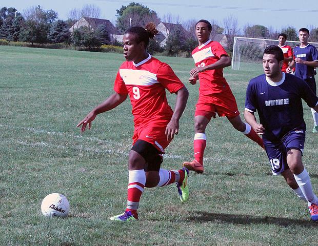 Adane Spence breaks free past his defender just before his second goal of the game today. Photo by Nicholas Huenefeld/Owens Sports Information