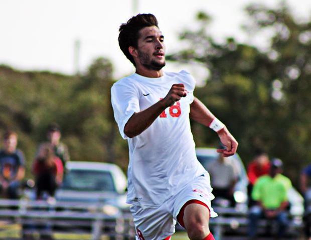 Matt Almester chases a defender in a recent match. The redshirt freshman had two goals, including the game-winner in today's 3-2 overtime win over Lake Michigan. Photo by Nicholas Huenefeld/Owens Sports Information