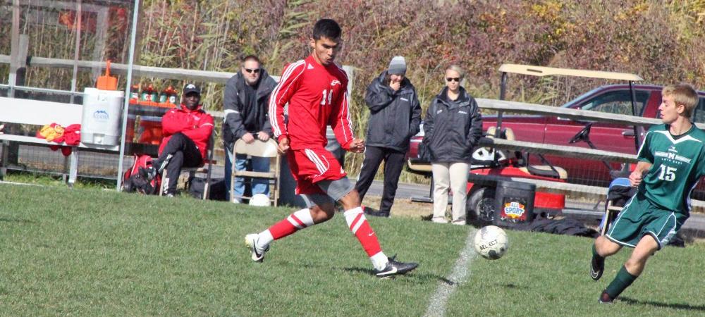 Hector Aguirre Jr. makes a pass in today's game. The freshman had a single game record six assists in the 11-1 win. Photo by Nicholas Huenefeld/Owens Sports Information