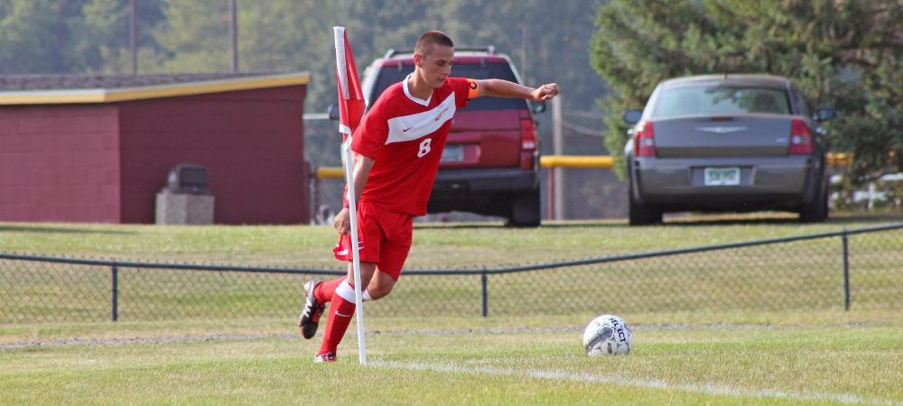 Reiss Liggitt attempts a corner kick in today's second half. Photo by Nicholas Huenefeld/Owens Sports Information