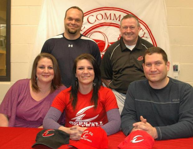 Chelsea Evans, front center, has become the first member of the 2013-14 Express softball freshmen class after signing her letter of intent. Photo by Owens Sports Information