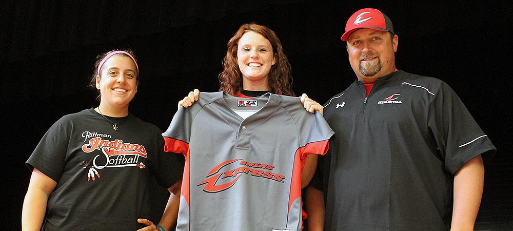 Megan Gregory, center, is joined by Owens head coach Marcus Smith, as well as Rittman head coach Amanda Macenko. Photo by Nicholas Huenefeld/Owens Sports Information
