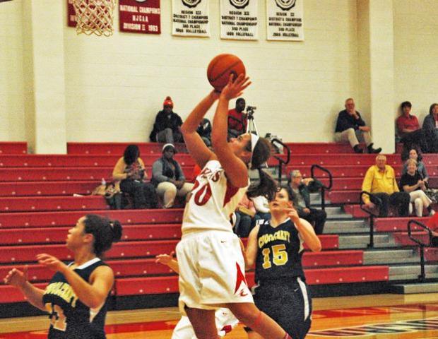 Emma-Jean Ricketts, pictured here in the first half, scored a career-high 24 points to go along with eight rebounds and three steals to lead the Express women past Schoolcraft 81-57. Photo by Kyle Wilber/Owens Sports Information