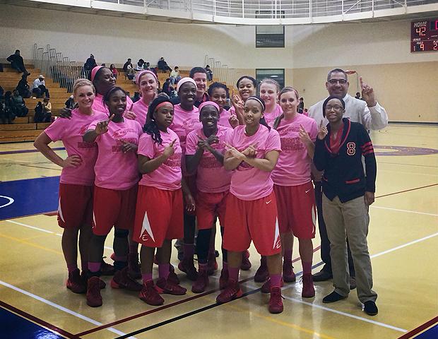 The No. 5 Express women's basketball team gathered for a team photo after winning their second straight OCCAC championship. Photo by Nicholas Huenefeld/Owens Sports Information