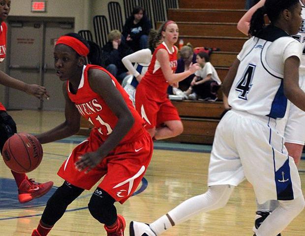 Eboni Adams, pictured here, prepares to turn a second half steal into a fast break opportunity in today's 92-39 win over Lakeland Community College. Photo by Nicholas Huenefeld/Owens Sports Information