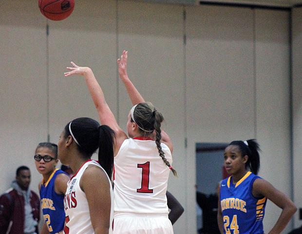 Paige Wright attempts a free throw in today's 74-58 win over No. 10 Monroe College. She had 18 points and 11 rebounds, while being named Tip Off Classic MVP. Photo by Nicholas Huenefeld/Owens Sports Information