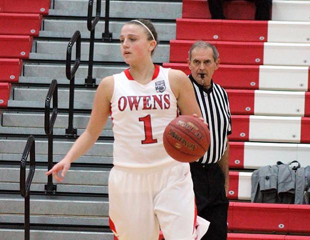 Paige Wright moves the ball across the half-court during tonight's 72-61 Express win over Mott. The sophomore had 10 points, 10 rebounds and seven assists. Photo by Nicholas Huenefeld/Owens Sports Information