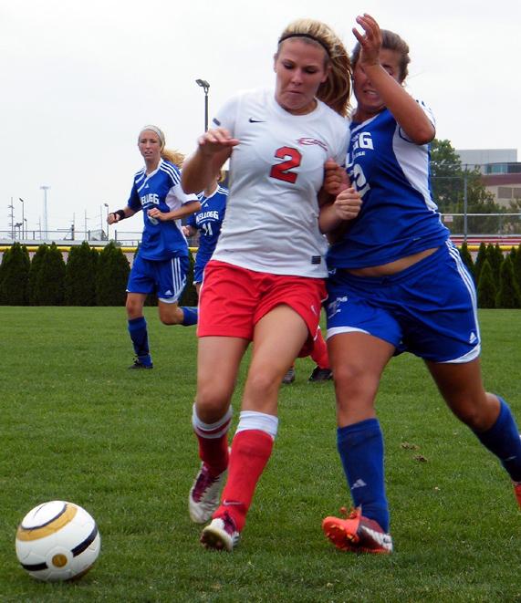 Sarah Weaver battles a Kellogg player for possession. Photo by Nicholas Huenefeld