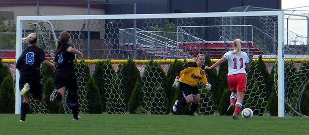 Kendra Eitniear prepares to score the first goal in Express women's soccer history. Photo by Nicholas Huenefeld