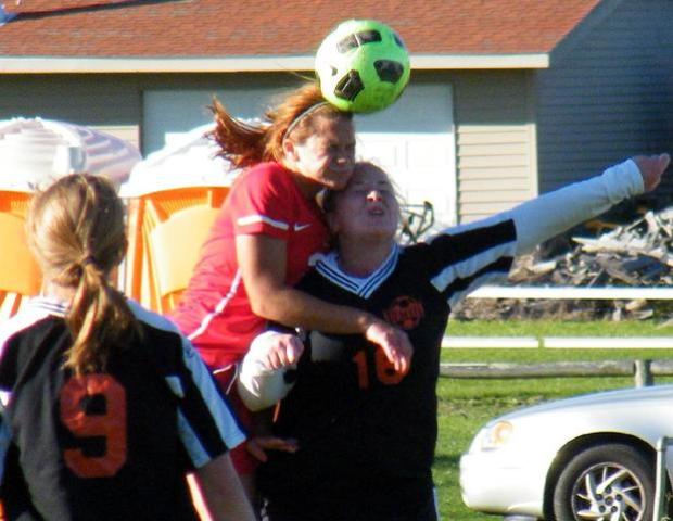 Jaime Sesock fights for the ball. Photo by Nicholas Huenefeld
