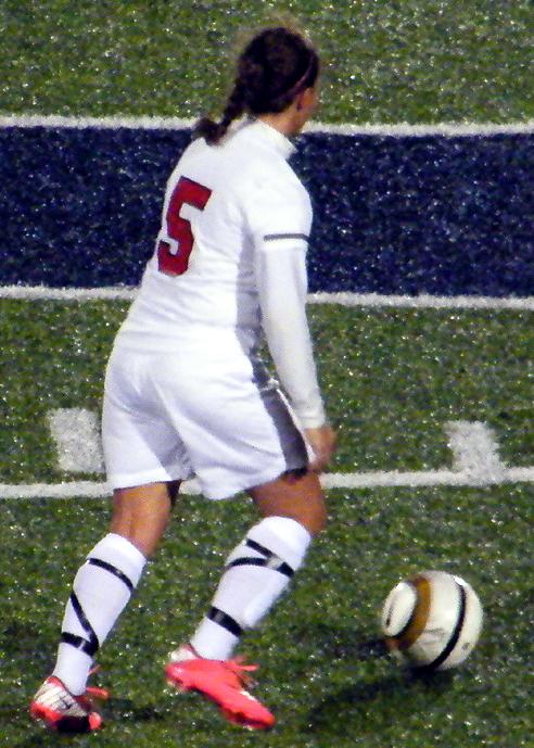 Erica Lankey prepares to move the ball in the open field against Lewis and Clark at Lake High School on Friday. Photo by Nicholas Huenefeld