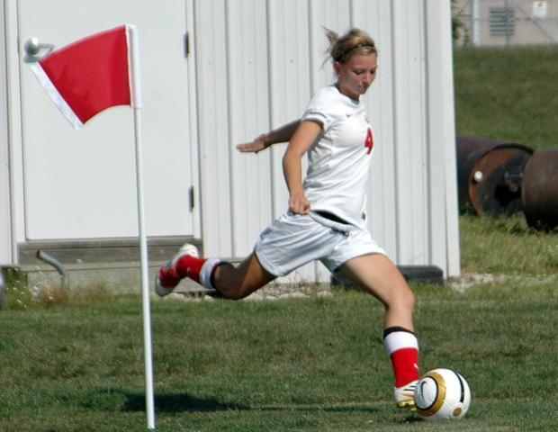 Jill Burkholder takes a corner kick. Photo by Nicholas Huenefeld/Owens Sports Information