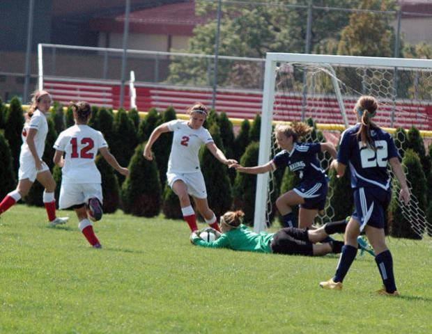 Erika Brinkman makes a save against Kellogg Community College on Sunday. The Express won 4-1. Photo by Nicholas Huenefeld/Owens Sports Information