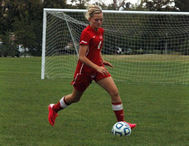 Jill Burkholder looks to make a move against Ohio Northern University's JV team. Photo by Nicholas Huenefeld/Owens Sports Information