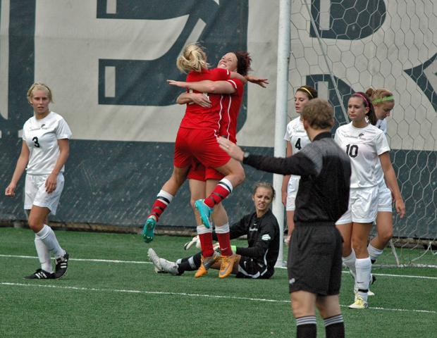 Kendra Eitniear jumps into the arms of Drew Plummer after Eitniear's goal late in the first half put the Express up 4-0. Photo by Nicholas Huenefeld/Owens Sports Information