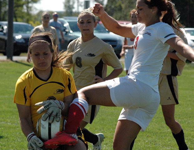 Jaime Sesock is rejected by Jackson CC's goalkeeper, Danielle Purgar, in the second half. Sesock, however, scored the lone goal for the Express earlier in the game. Photo by Nicholas Huenefeld/Owens Sports Information
