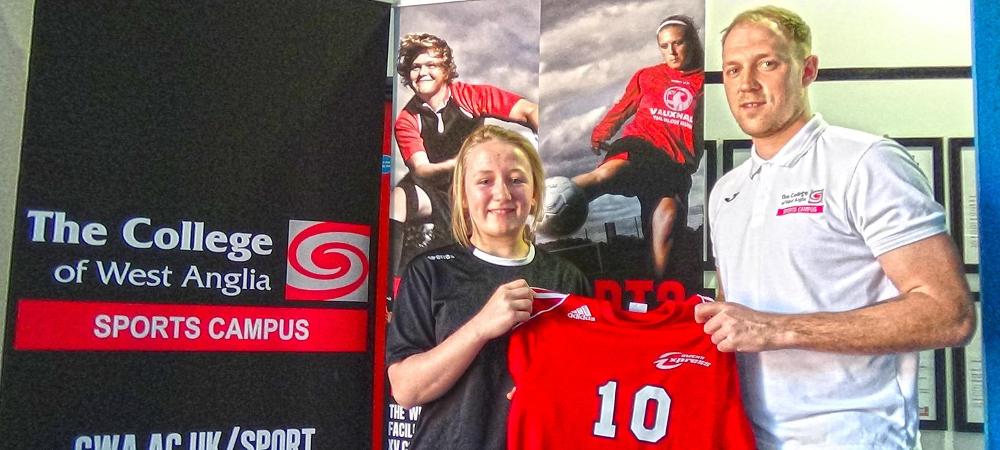 Dayna Kingshott is pictured here with her King's Lynn Elite head coach James Buhlemann, after signing to play soccer at Owens. Photo provided to Owens Sports Information