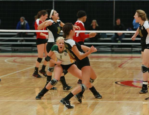Players from Parkland College celebrate a point against the Express in the NJCAA D-II Consolation Match. Photo by Frawgbyte Photography